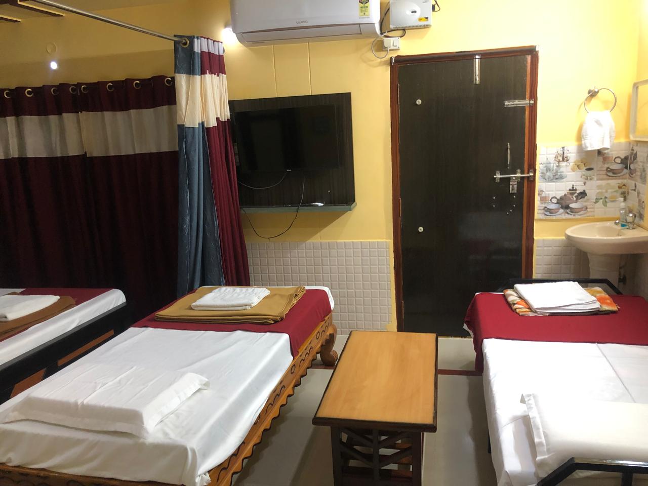 Bedroom with wall-mounted television